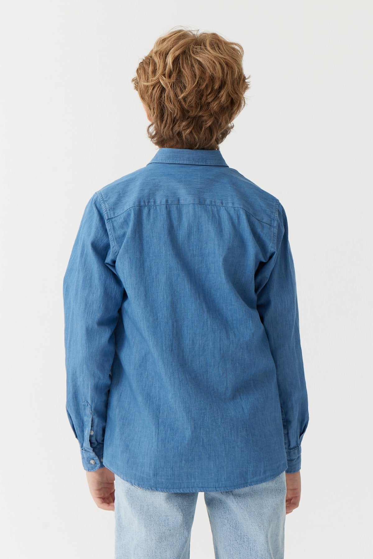 کراسێکی قۆڵ درێژی کوڕان