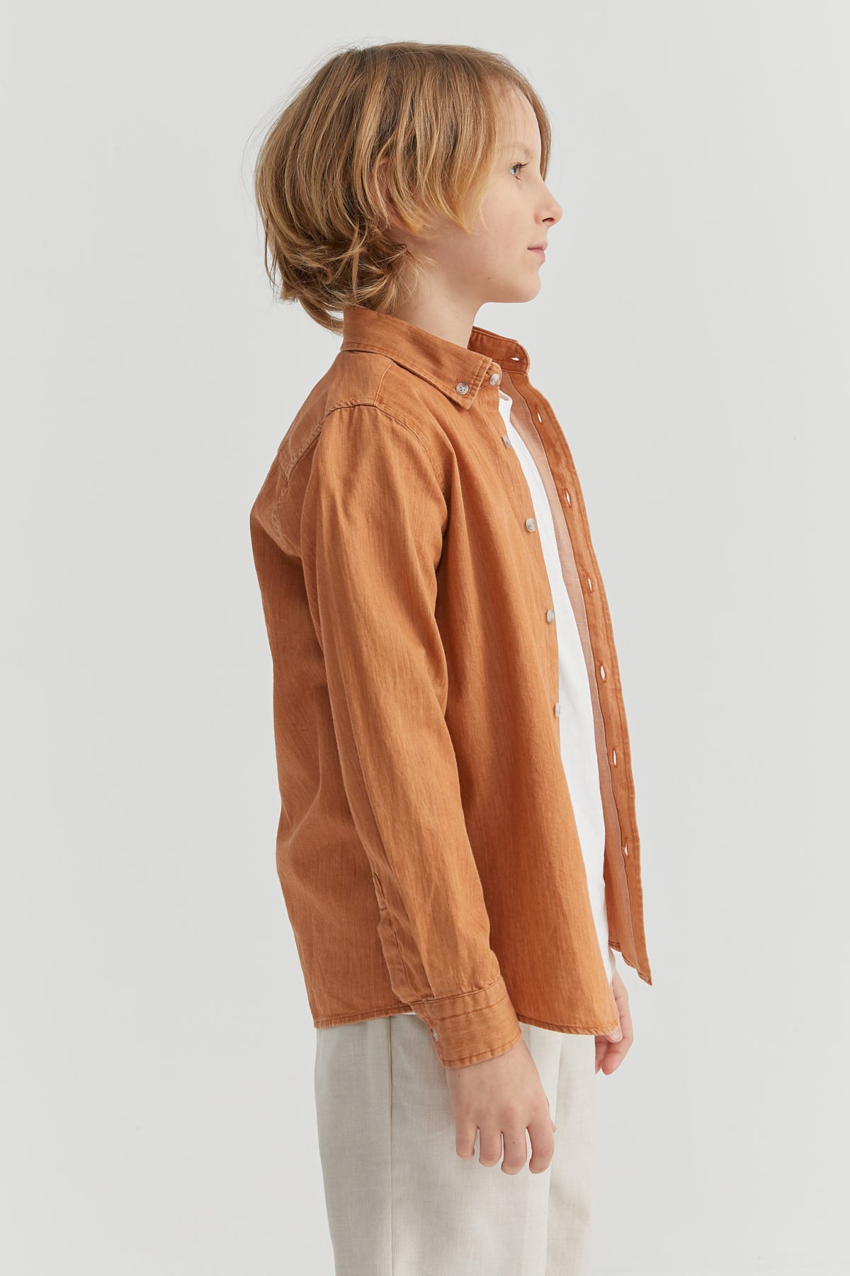 کراسێکی قۆڵ درێژی کوڕان