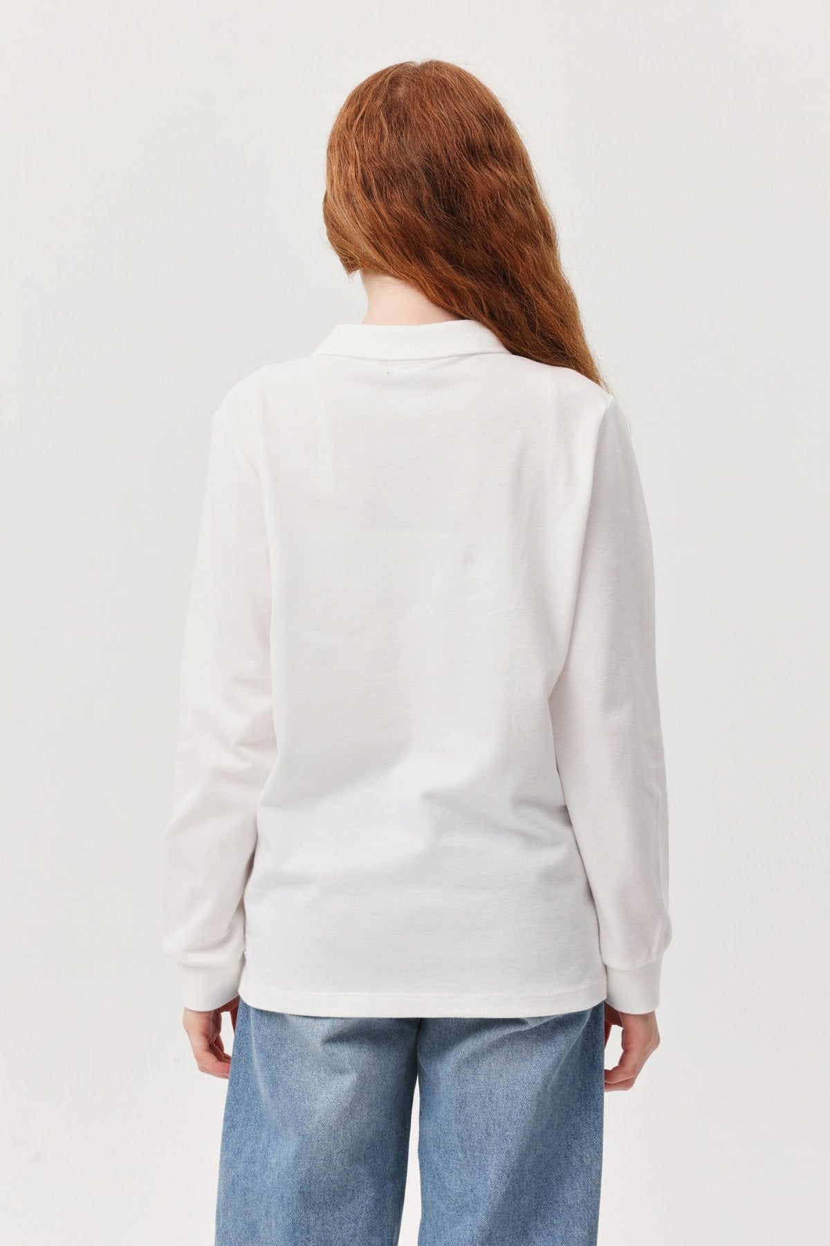 تیشێرتێکی قۆڵ درێژی ملی پۆلۆی کچان