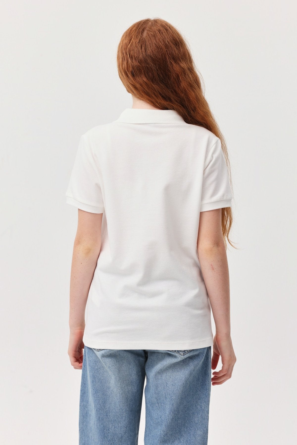 تیشێرتێکی کچان بۆ مل پۆلۆ