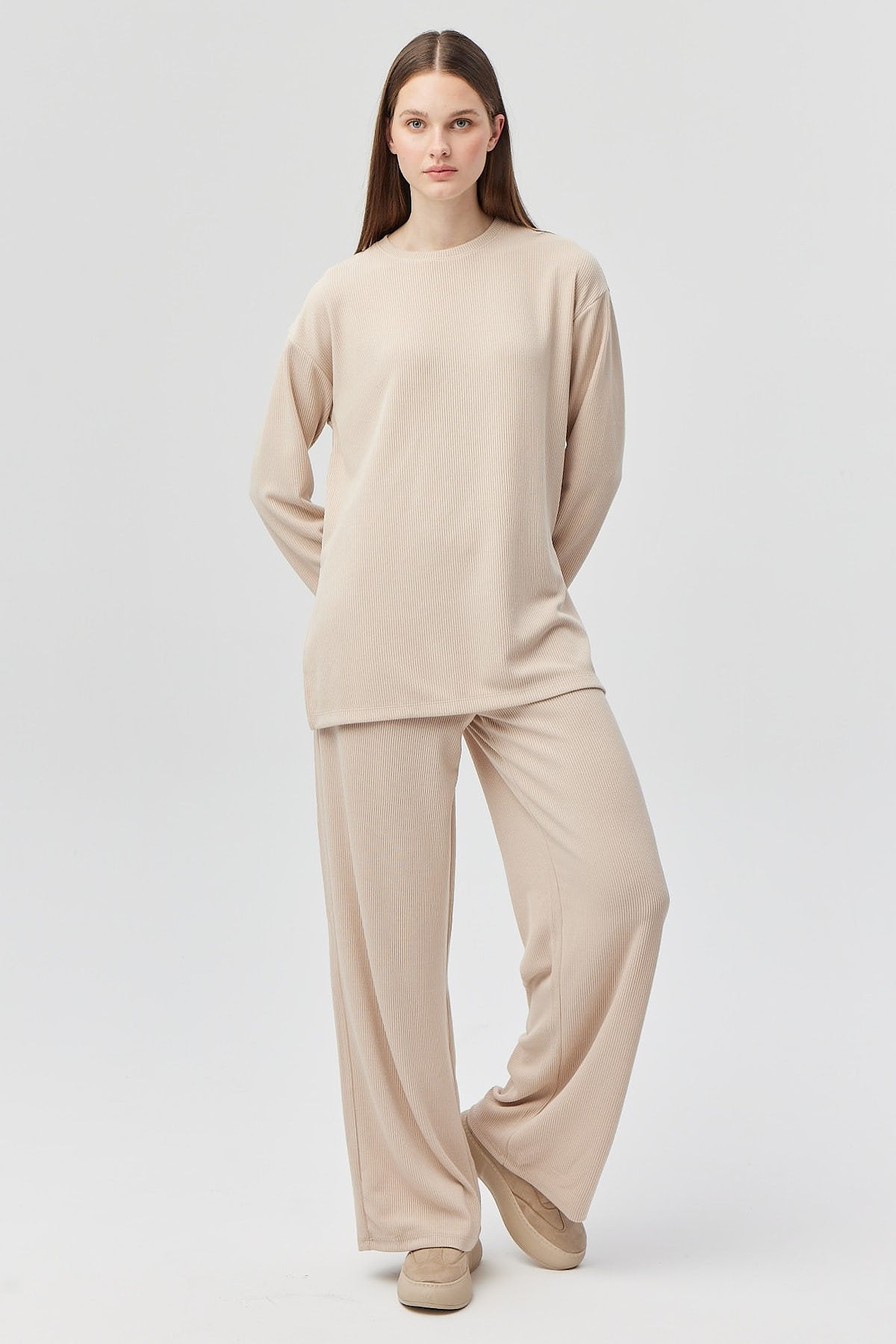 پانتۆڵی لاستیکی کەمەر گرێدراوی ئافرەتان