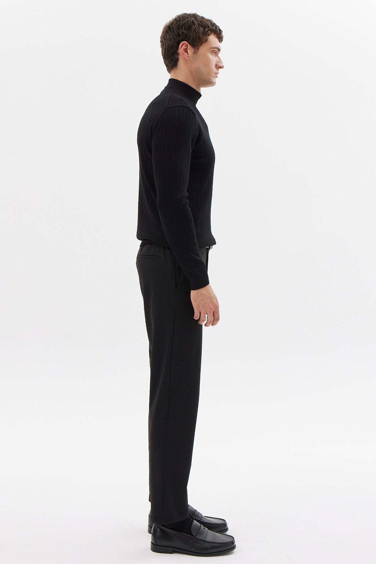 پانتۆڵی جۆگەری پیاوان بە کەمەرێکی لاستیک