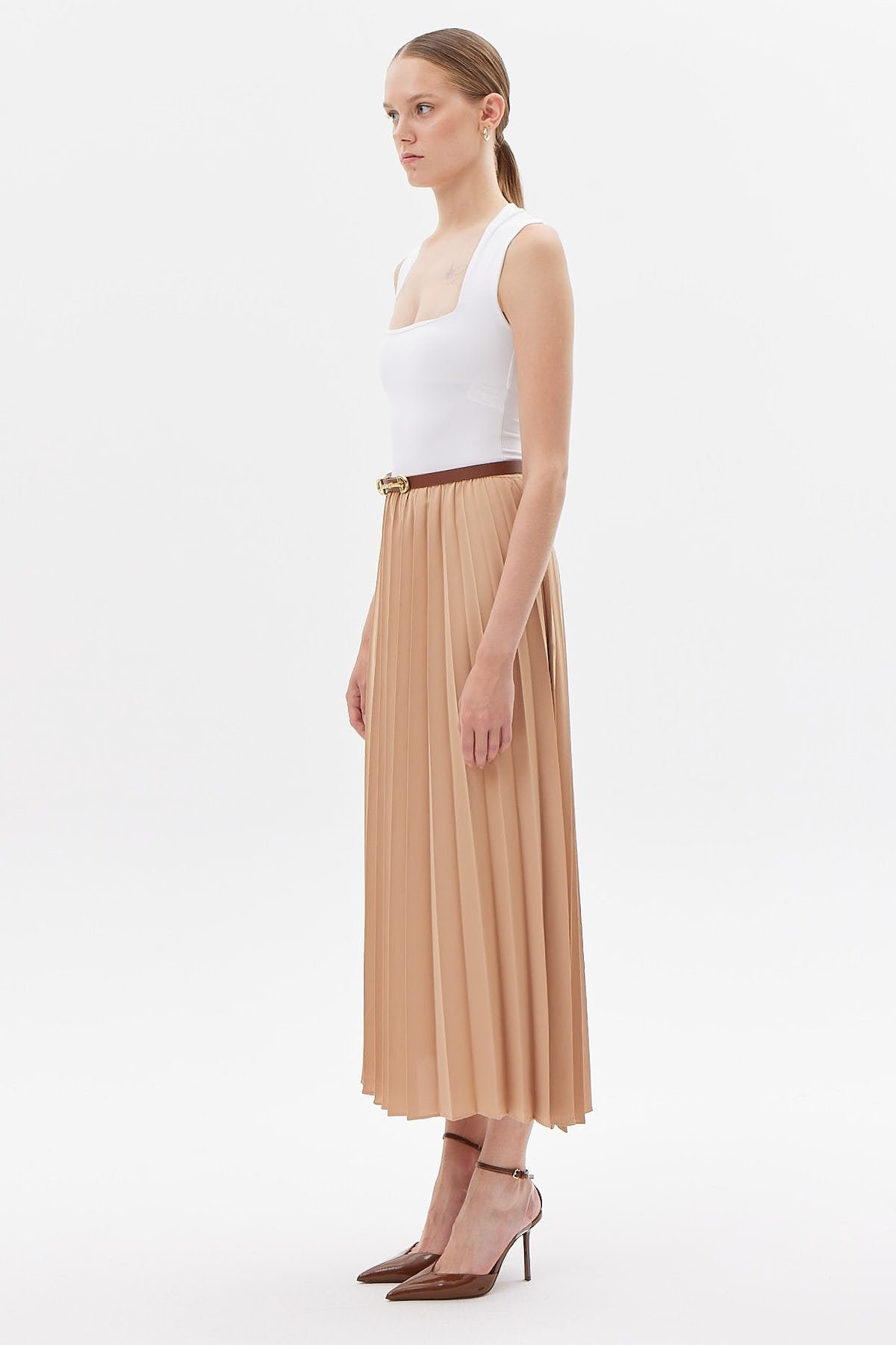 تەنووری پلیتی ئافرەتان