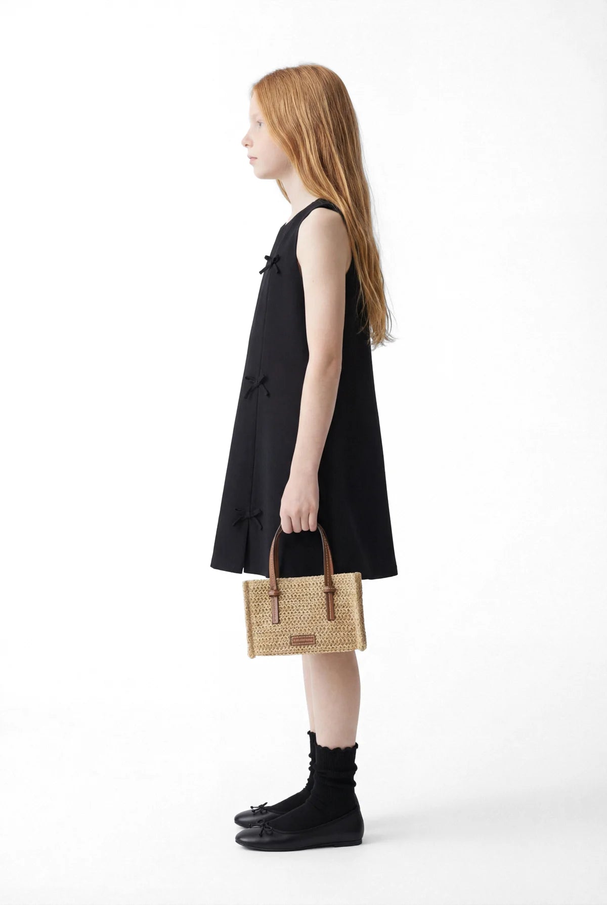 Girl's Sleeveless Dress with Bow Detail