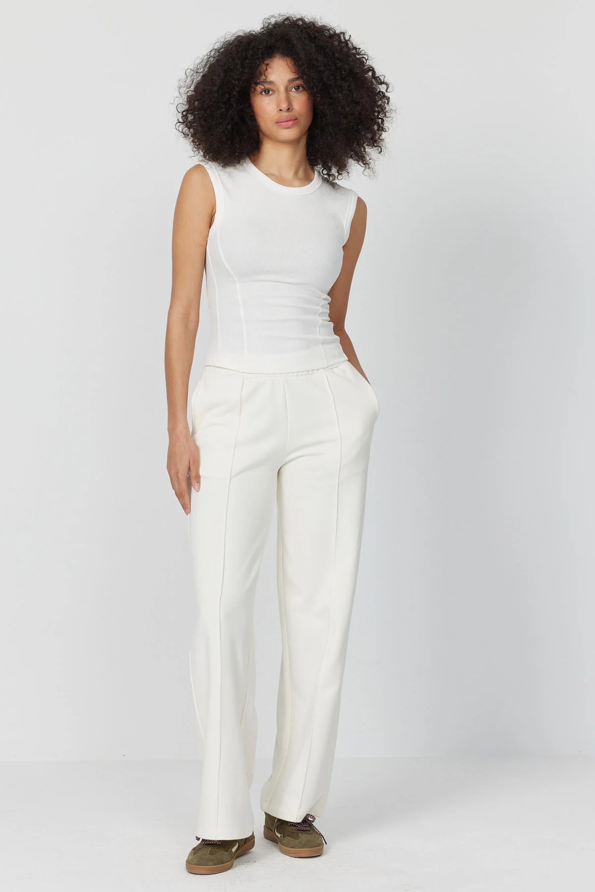 بلوزی بە پلیتی ئافرەتان