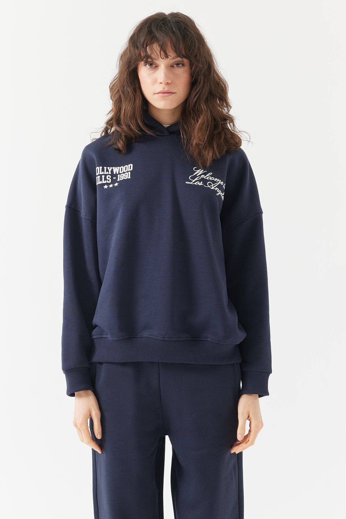 سويت شيرت نسائي بغطاء رأس 