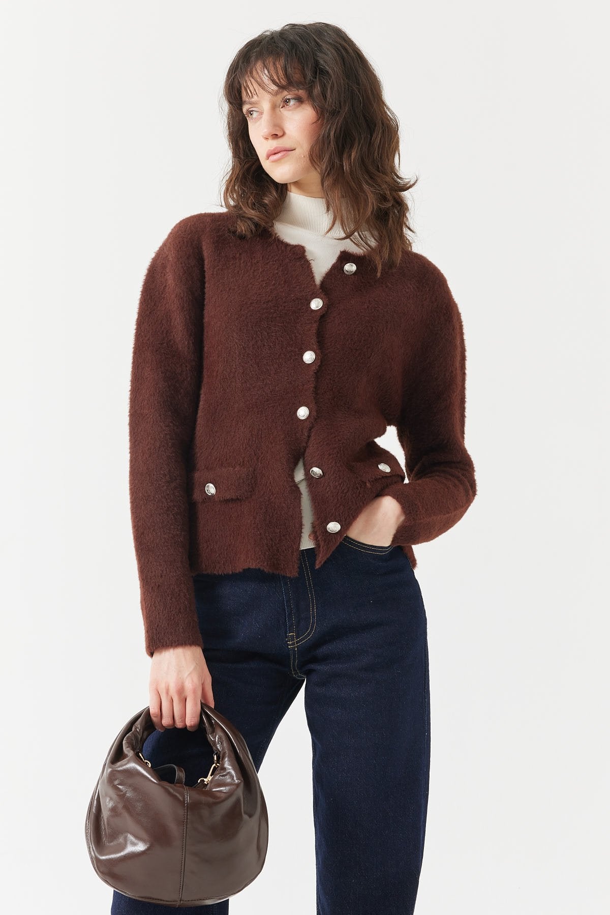 کاردیگانی ئافرەتان  بە شێوەی پڵەس و گیرفان